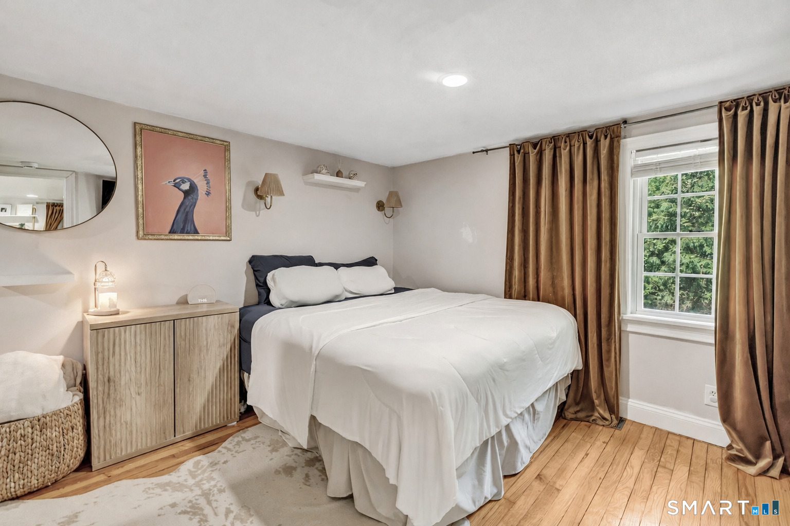 57 Olmstead Road Redding, CT 06896 - Photo 10 of 22 a bedroom with a large bed and a window