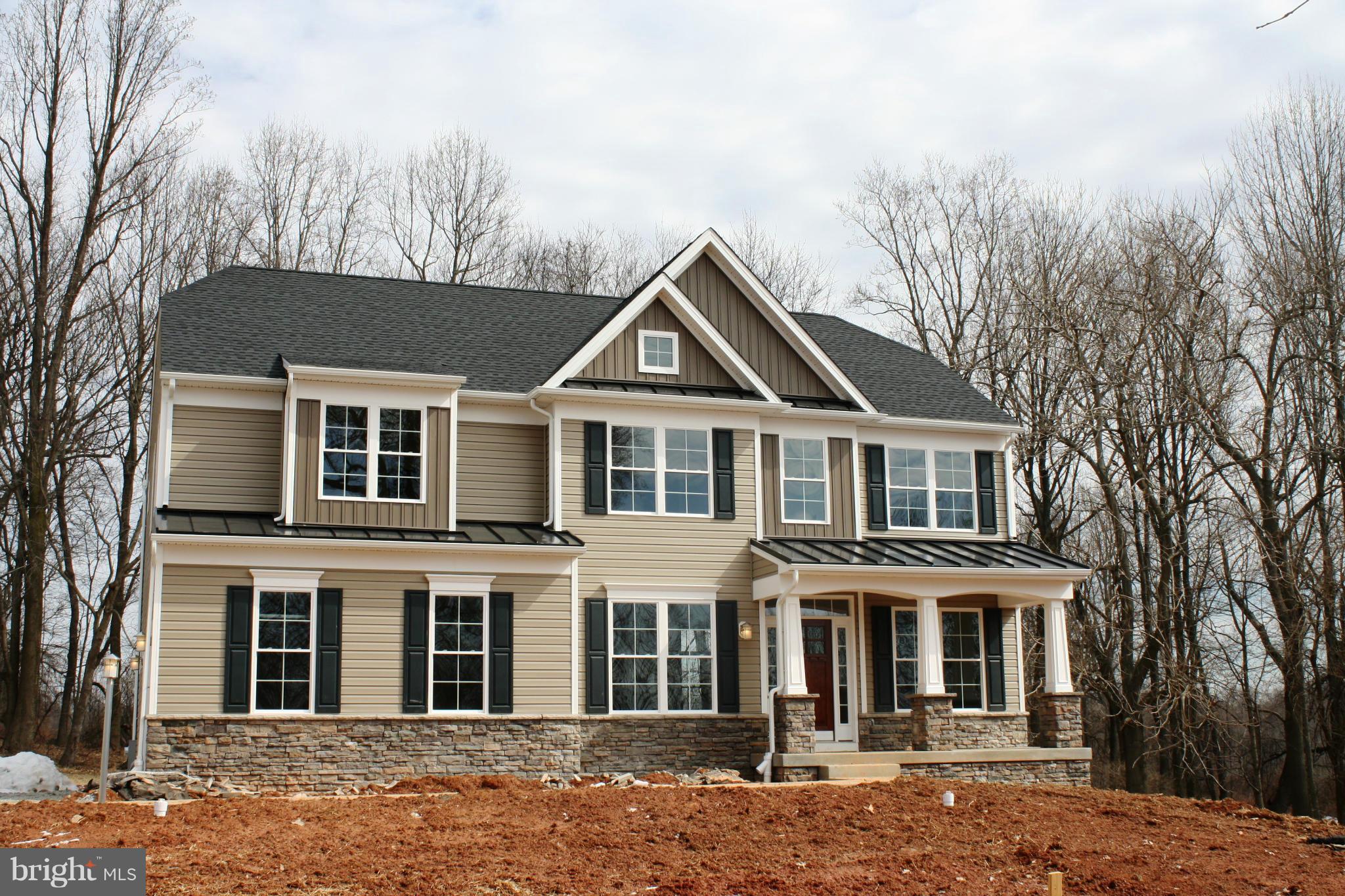 1735 Laurel Brook Road Fallston, MD 21047 - Photo 2 of 20 a front view of a house with a yard