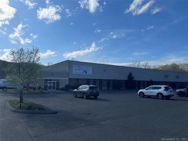 a car parked in front of a house