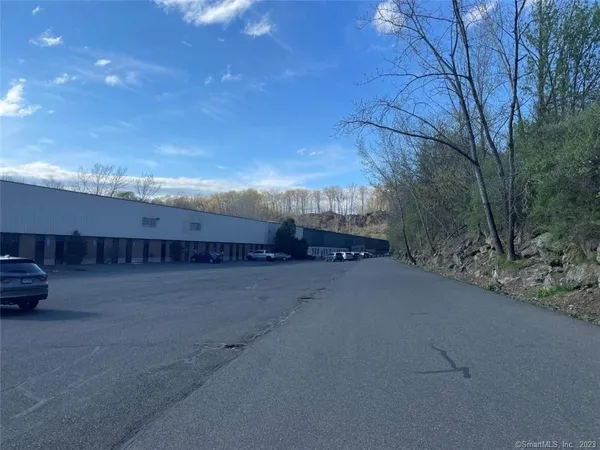 a view of a house with a street