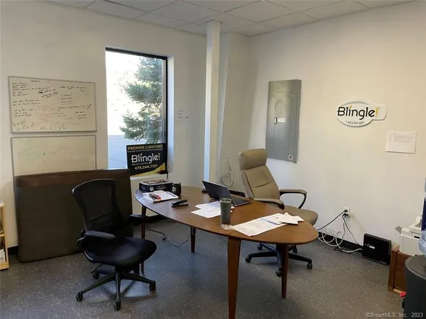 a view of a living room with entryway