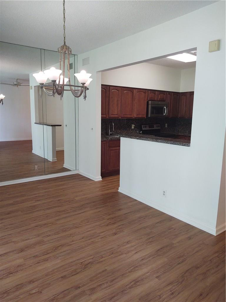 5801 Coach House Circle, Unit B Boca Raton, FL 33486 - Photo 12 of 39 Dining Room