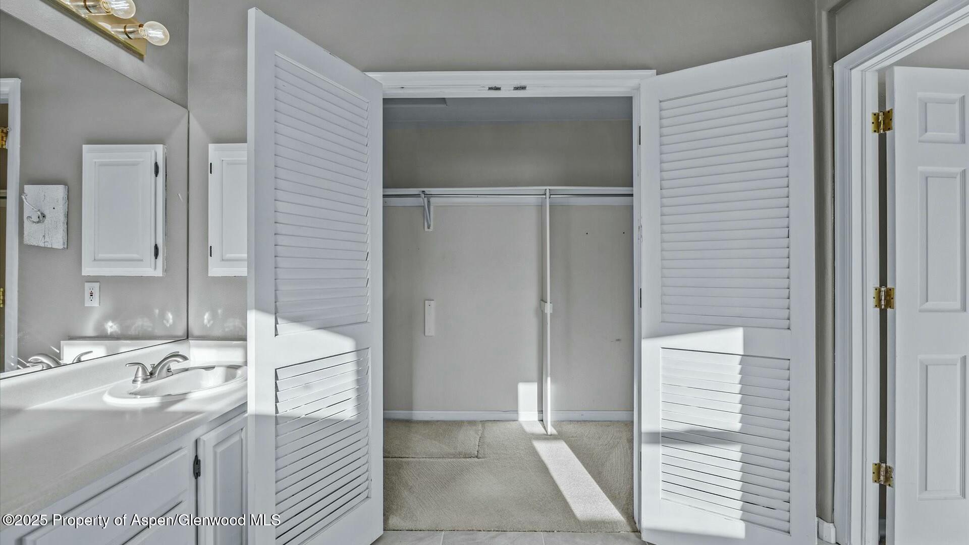 80 Juniper Lane Parachute, CO 81635 - Photo 19 of 30 a bathroom with a sink and a mirror