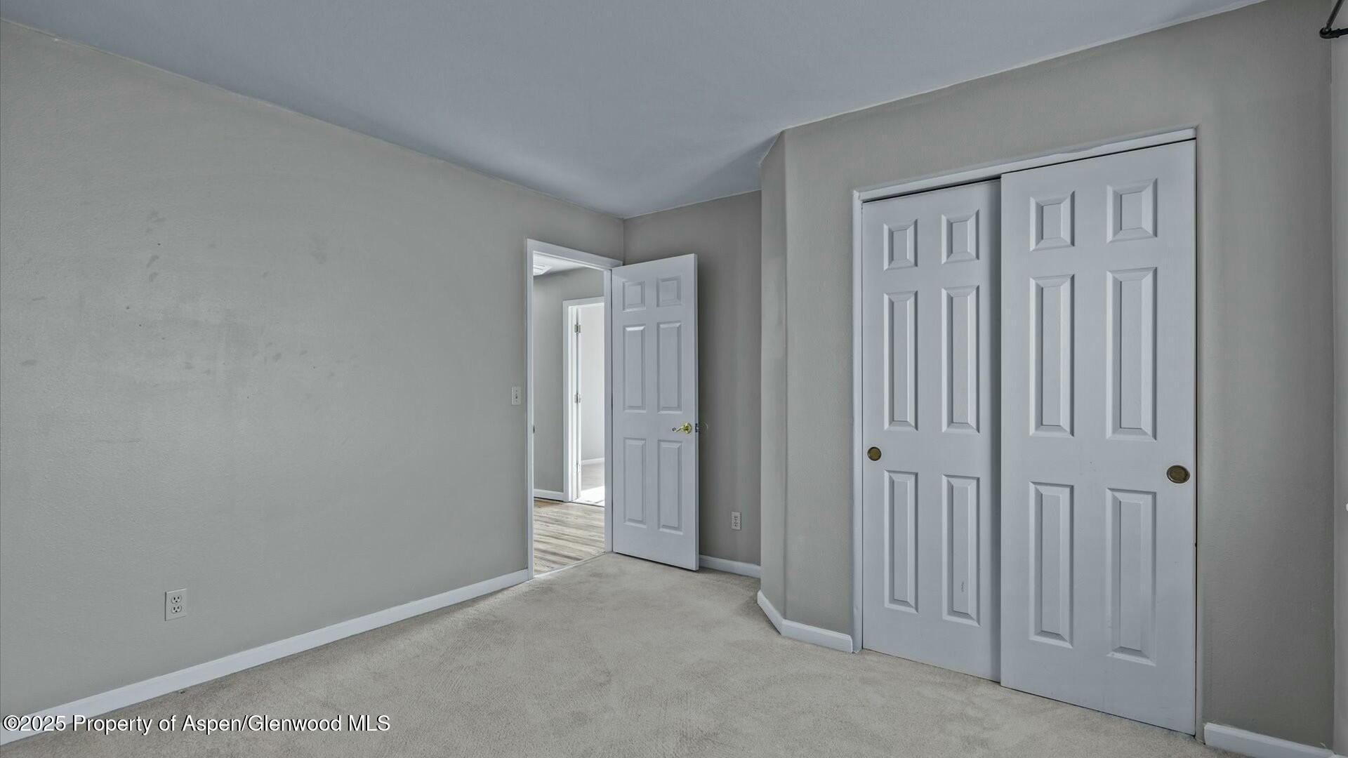 80 Juniper Lane Parachute, CO 81635 - Photo 21 of 30 an empty room with windows
