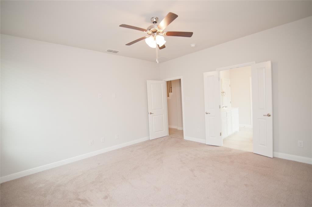 1021 Gillespie Drive Fort Worth, TX 76247 - Photo 17 of 38 a view of an empty room