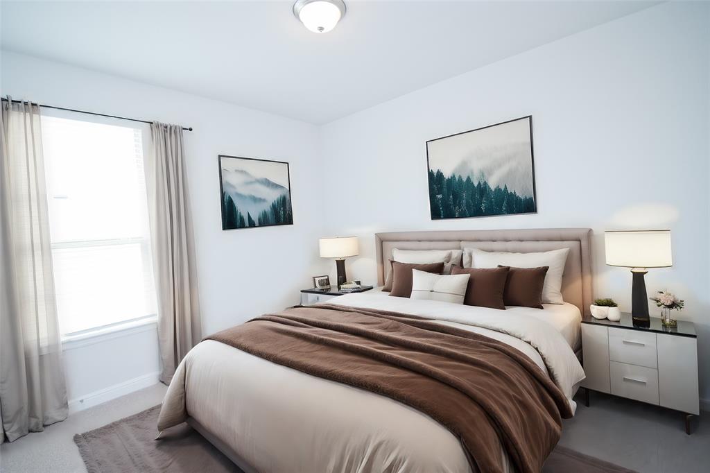 1021 Gillespie Drive Fort Worth, TX 76247 - Photo 26 of 38 a bedroom with bed and window