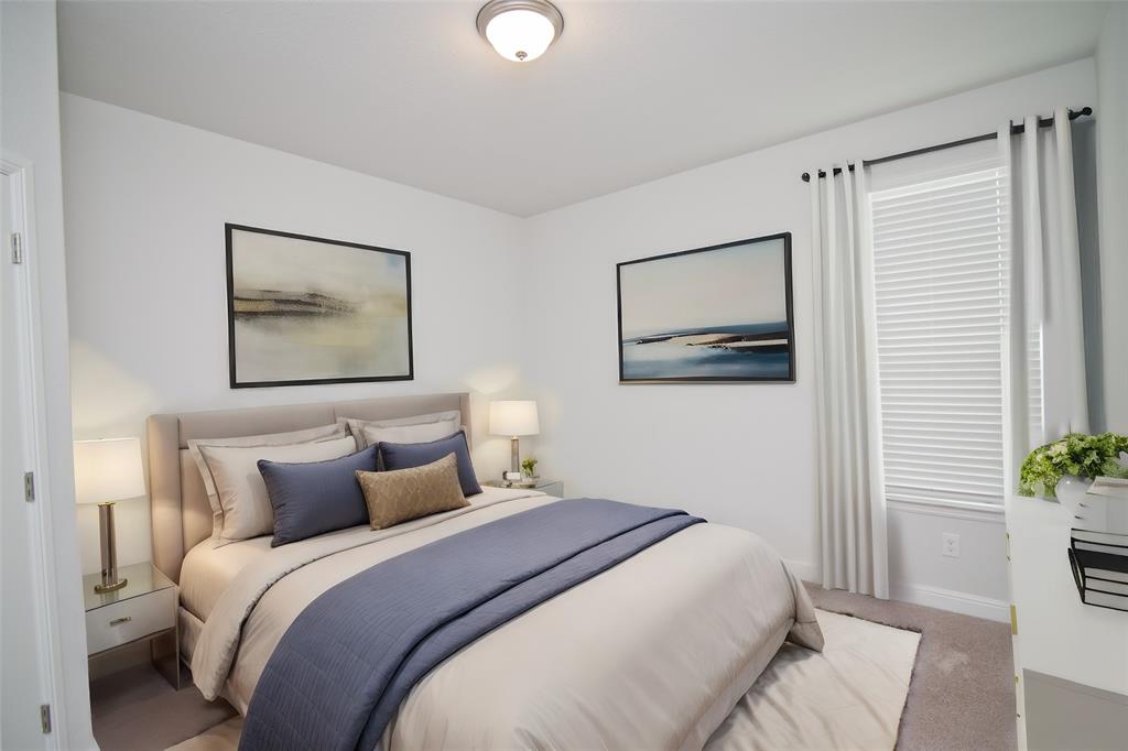 1021 Gillespie Drive Fort Worth, TX 76247 - Photo 28 of 38 a bedroom with a bed and a painting on the wall