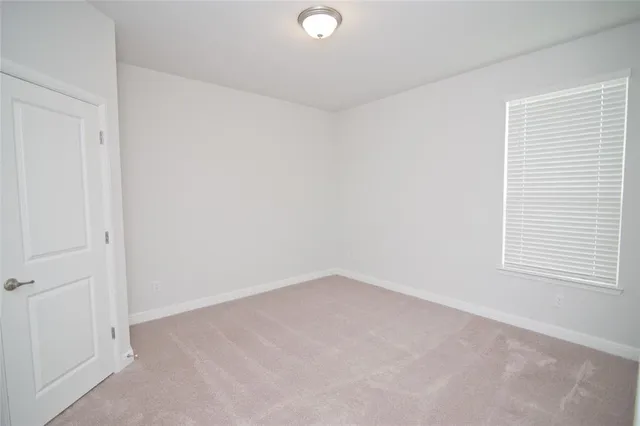 a bathroom with a bathtub shower sink vanity and toilet