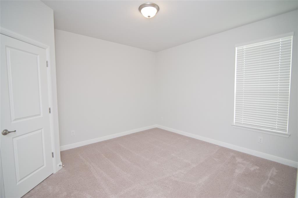 1021 Gillespie Drive Fort Worth, TX 76247 - Photo 29 of 38 a view of an empty room with a window