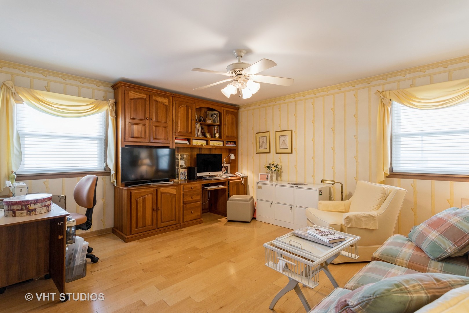 4545 North Long Avenue, Unit 3D Chicago, IL 60630 - Photo 14 of 19 a living room with furniture a flat screen tv and a window