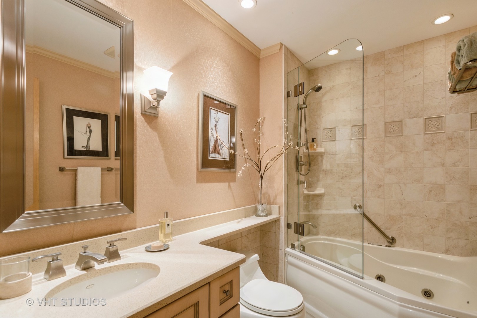 4545 North Long Avenue, Unit 3D Chicago, IL 60630 - Photo 16 of 19 a bathroom with a sink a toilet and shower