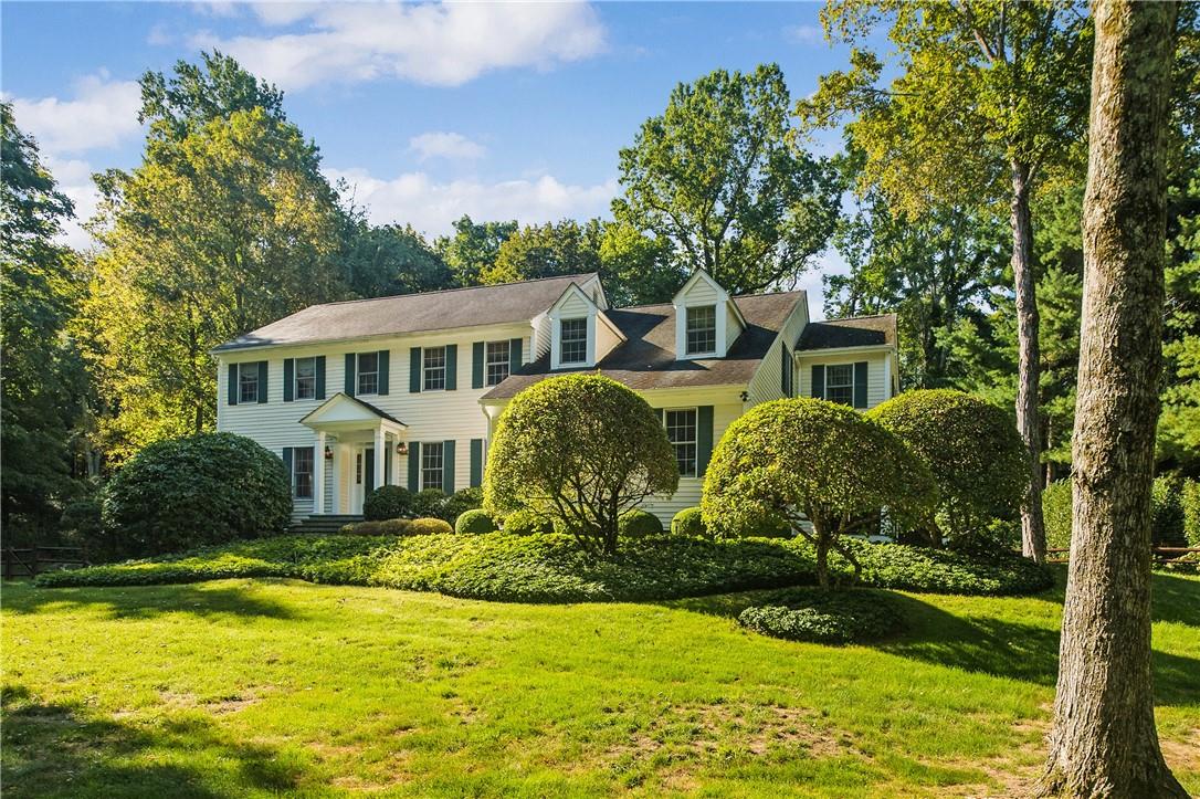a front view of a house with swimming pool