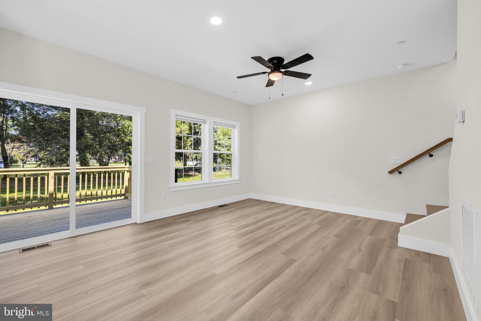 1 Sunrise Avenue Ridgely, MD 21660 - Photo 10 of 28 wooden floor in an empty room with a window