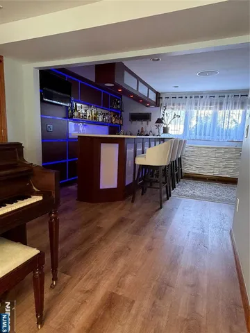 a bedroom with a bed and furniture