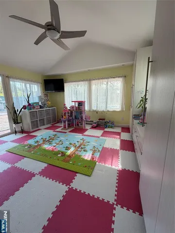 a bed room with a bed and a fireplace