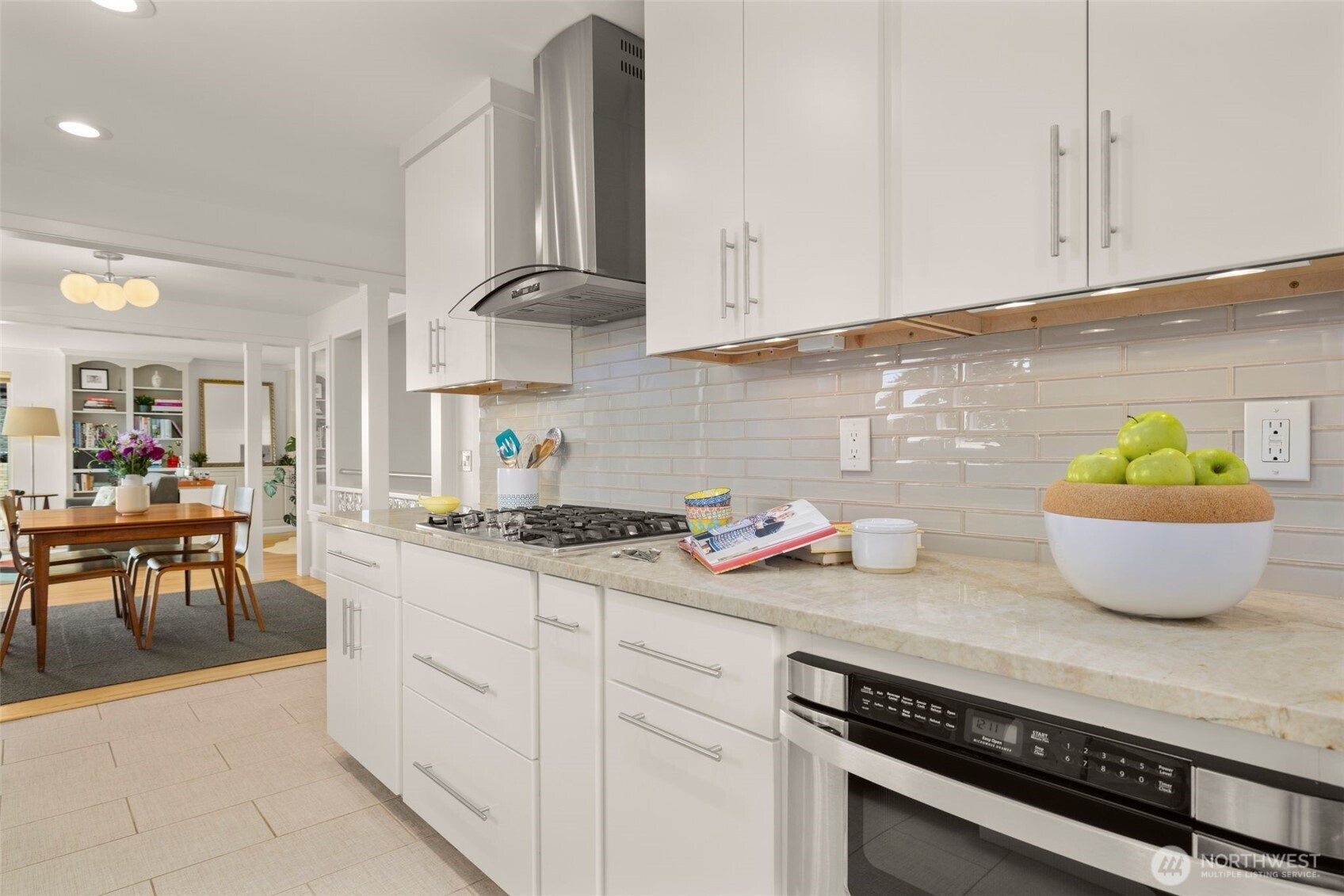 4110 Southwest Rose Street Seattle, WA 98136 - Photo 11 of 39 a kitchen with a sink and cabinets