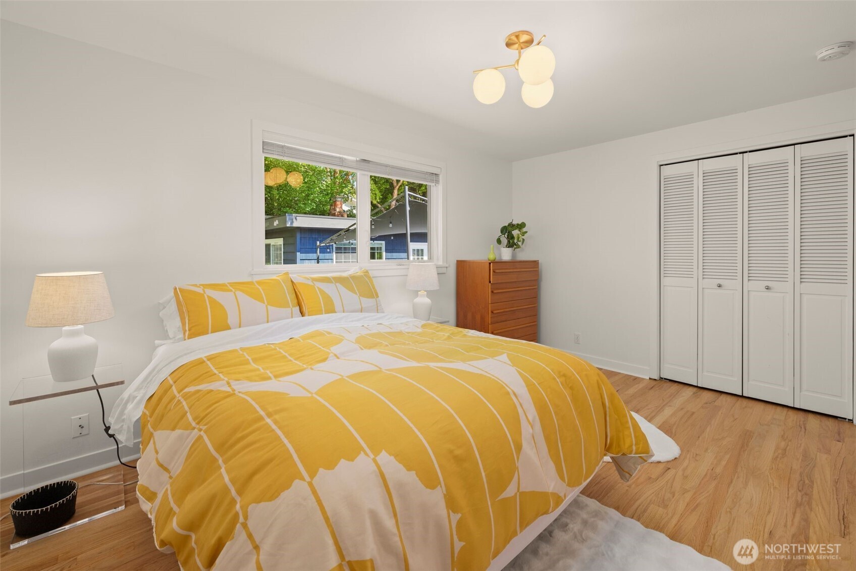 4110 Southwest Rose Street Seattle, WA 98136 - Photo 13 of 39 a bedroom with a bed and a window