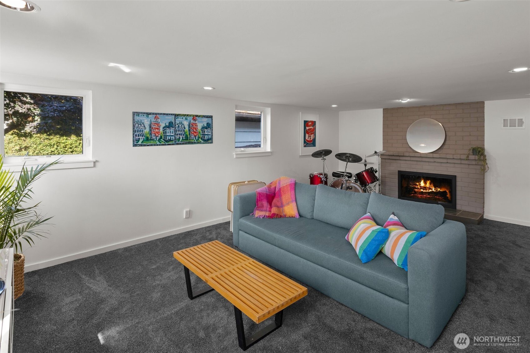 4110 Southwest Rose Street Seattle, WA 98136 - Photo 18 of 39 a living room with furniture and a flat screen tv