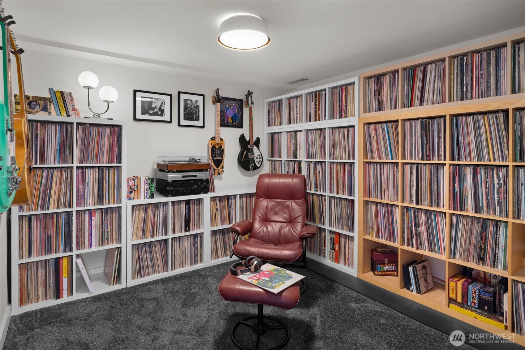 4110 Southwest Rose Street Seattle, WA 98136 - Photo 20 of 39 a room with furniture workspace and book shelf