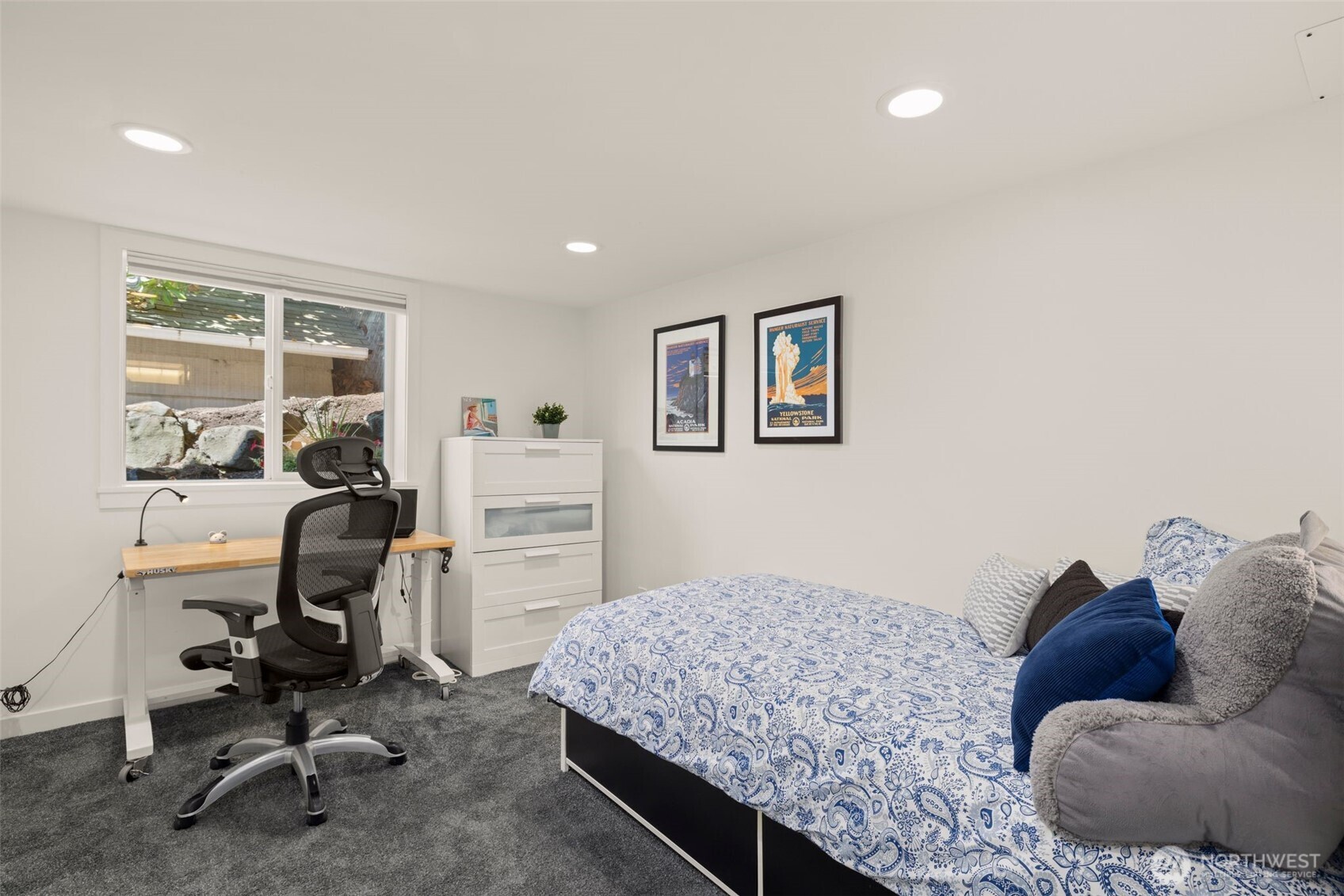 4110 Southwest Rose Street Seattle, WA 98136 - Photo 21 of 39 a bedroom with a large bed and furniture