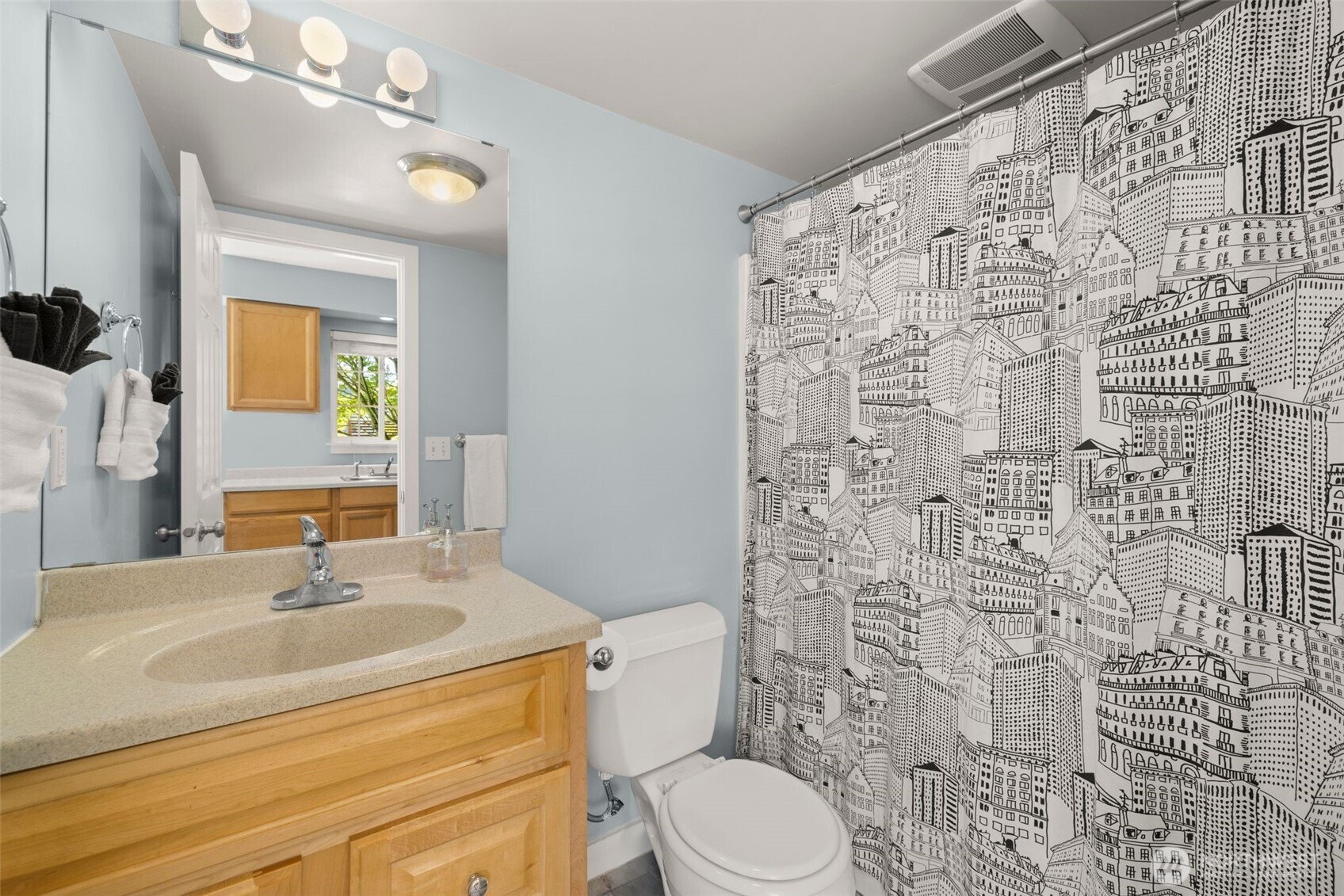 4110 Southwest Rose Street Seattle, WA 98136 - Photo 27 of 39 a bathroom with a sink toilet and shower