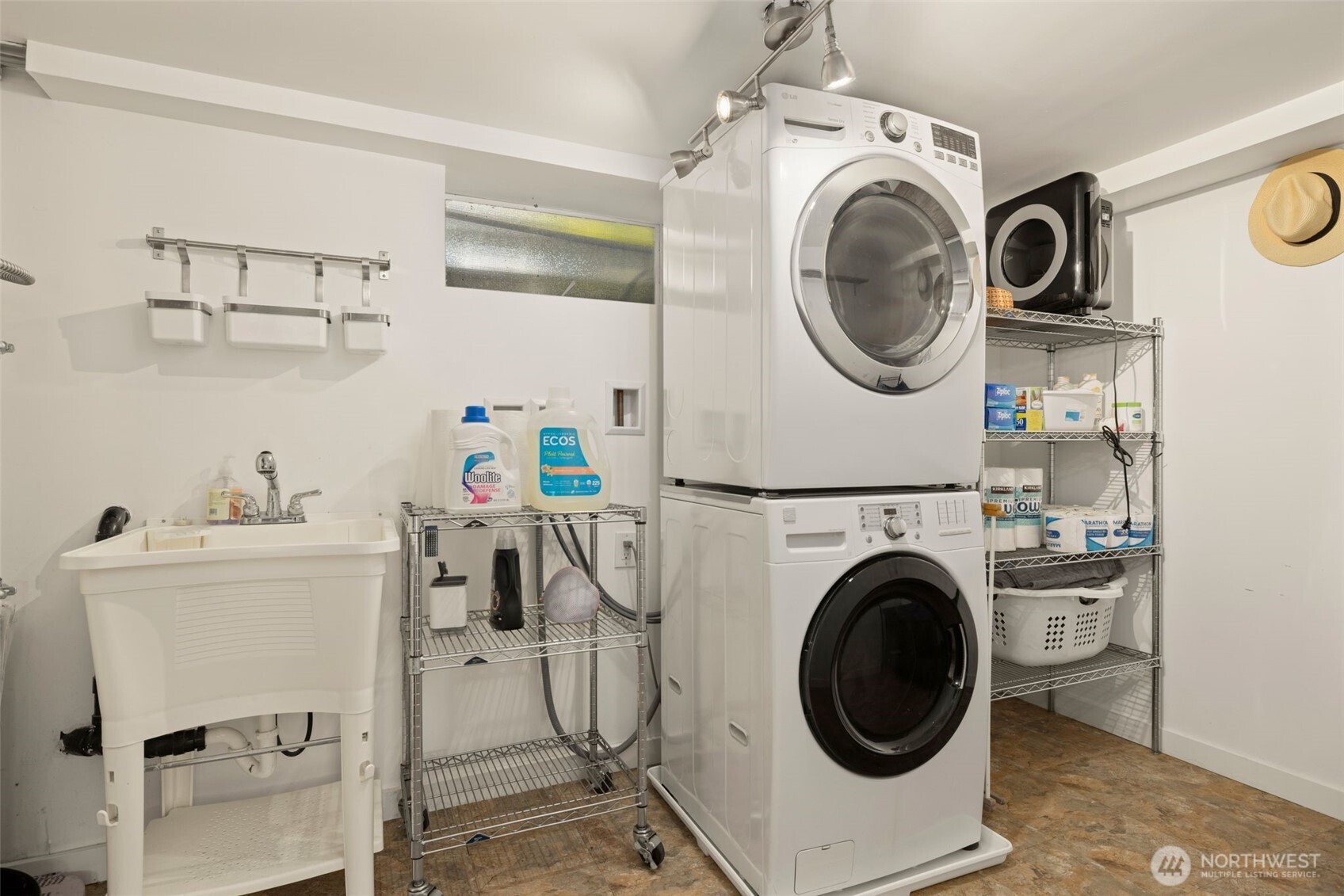 4110 Southwest Rose Street Seattle, WA 98136 - Photo 29 of 39 a utility room with sink dryer and washer