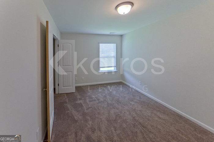 105 Bluff Road Springfield, GA 31329 - Photo 13 of 21 an empty room with windows
