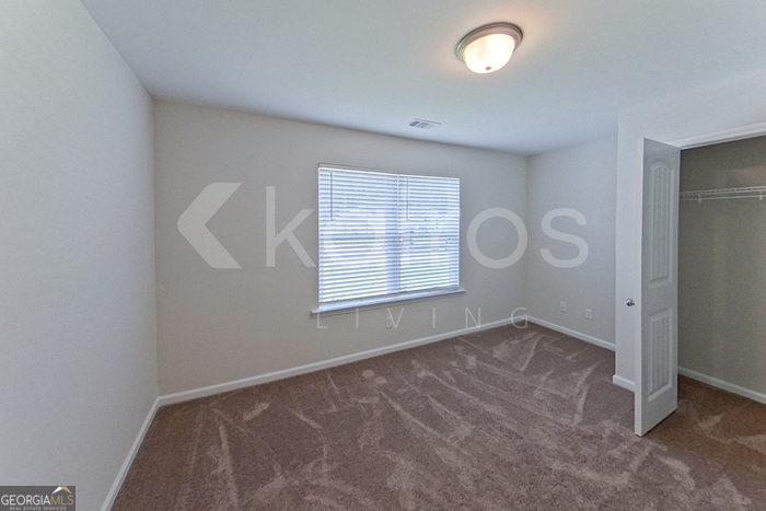 105 Bluff Road Springfield, GA 31329 - Photo 10 of 21 an empty room with windows