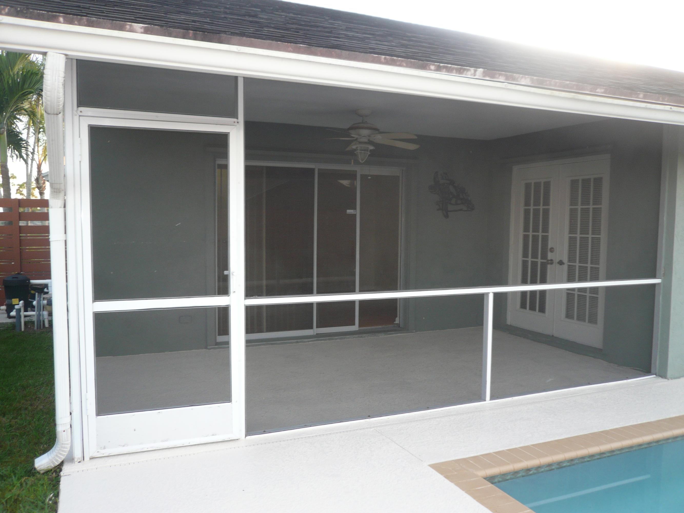 6287 Garrett Street Jupiter, FL 33458 - Photo 2 of 17 a view of a balcony