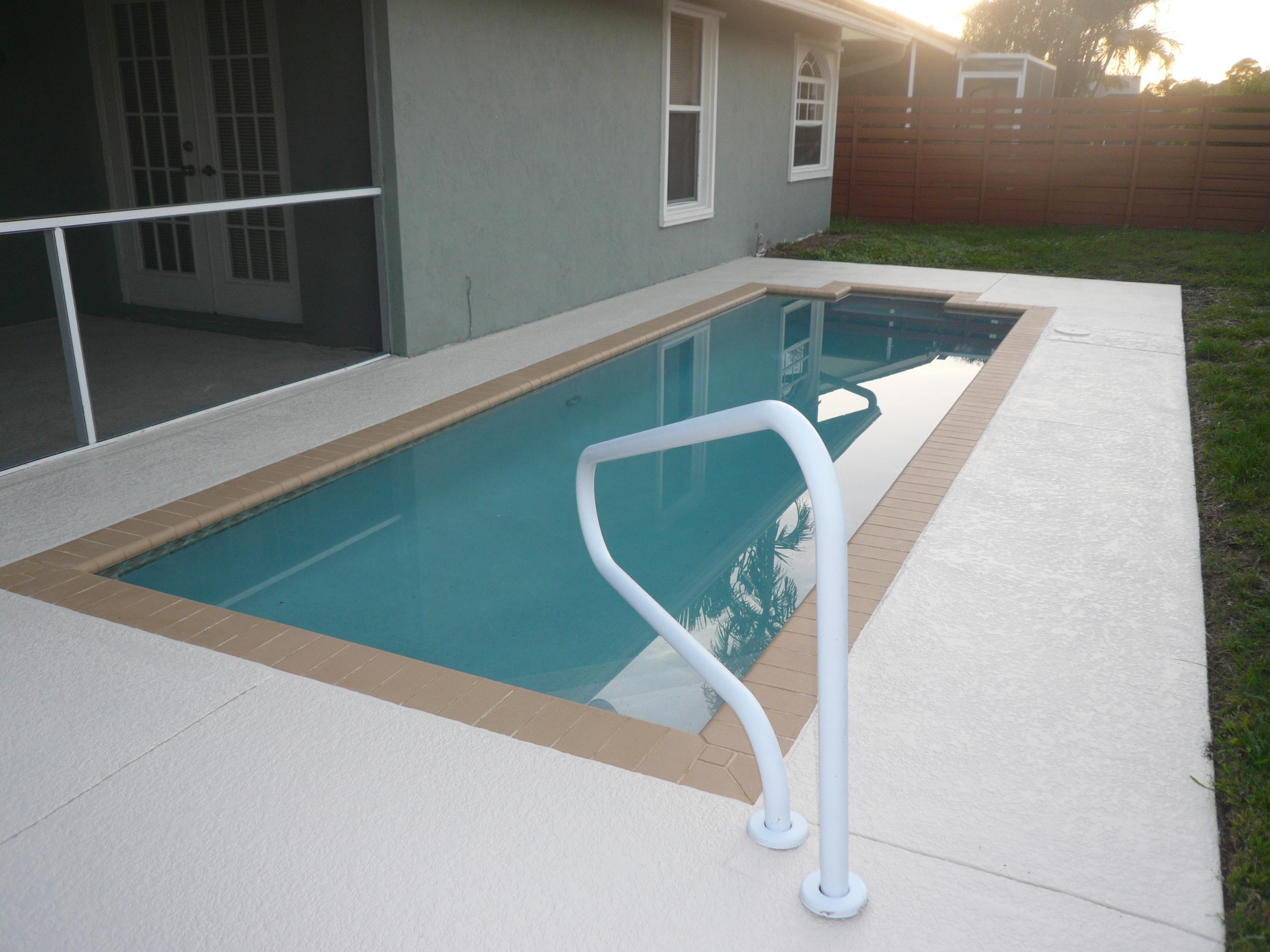 6287 Garrett Street Jupiter, FL 33458 - Photo 3 of 17 a view of swimming pool