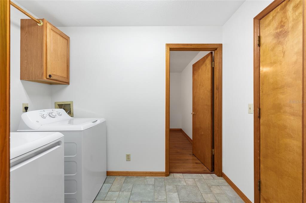 12861 Southwest 45th Lane Road Ocala, FL 34481 - Photo 23 of 73 a utility room with dryer and washer