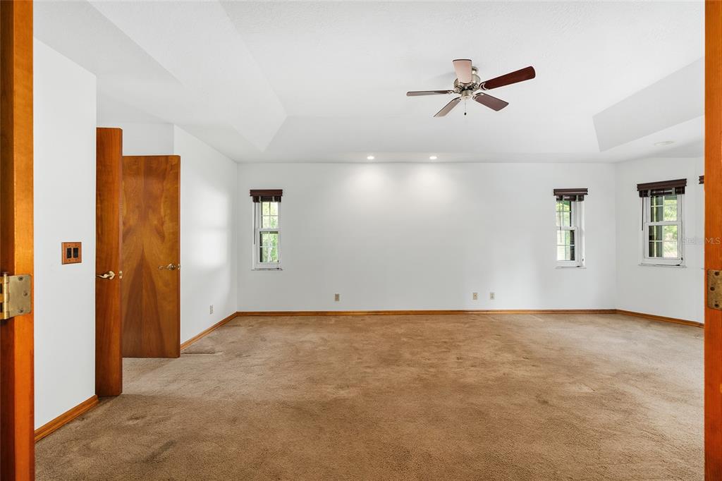 12861 Southwest 45th Lane Road Ocala, FL 34481 - Photo 24 of 73 a view of a livingroom with a ceiling fan and window