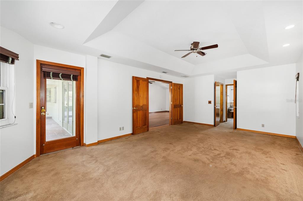 12861 Southwest 45th Lane Road Ocala, FL 34481 - Photo 25 of 73 a view of empty room with ceiling fan