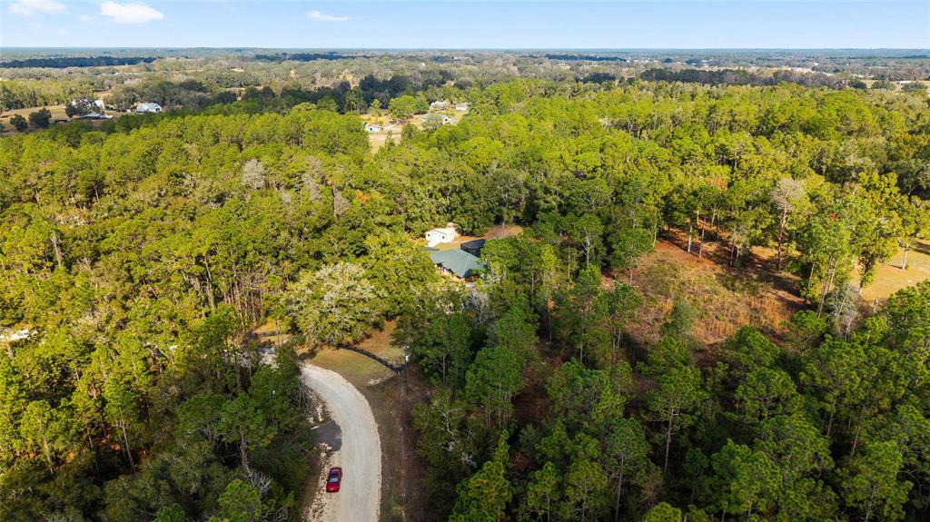12861 Southwest 45th Lane Road Ocala, FL 34481 - Photo 61 of 73 a view of an outdoor space and a mountain view