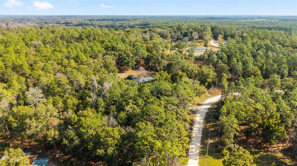 12861 Southwest 45th Lane Road Ocala, FL 34481 - Photo 62 of 73 a view of a city with an outdoor space