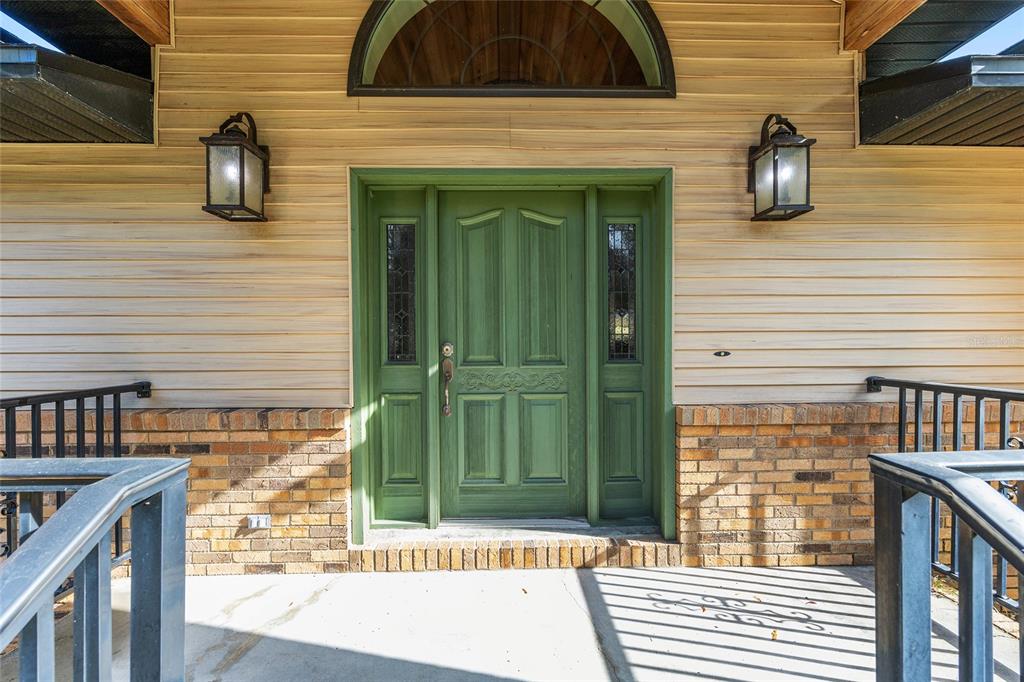 12861 Southwest 45th Lane Road Ocala, FL 34481 - Photo 8 of 73 a view of entrance door of the house
