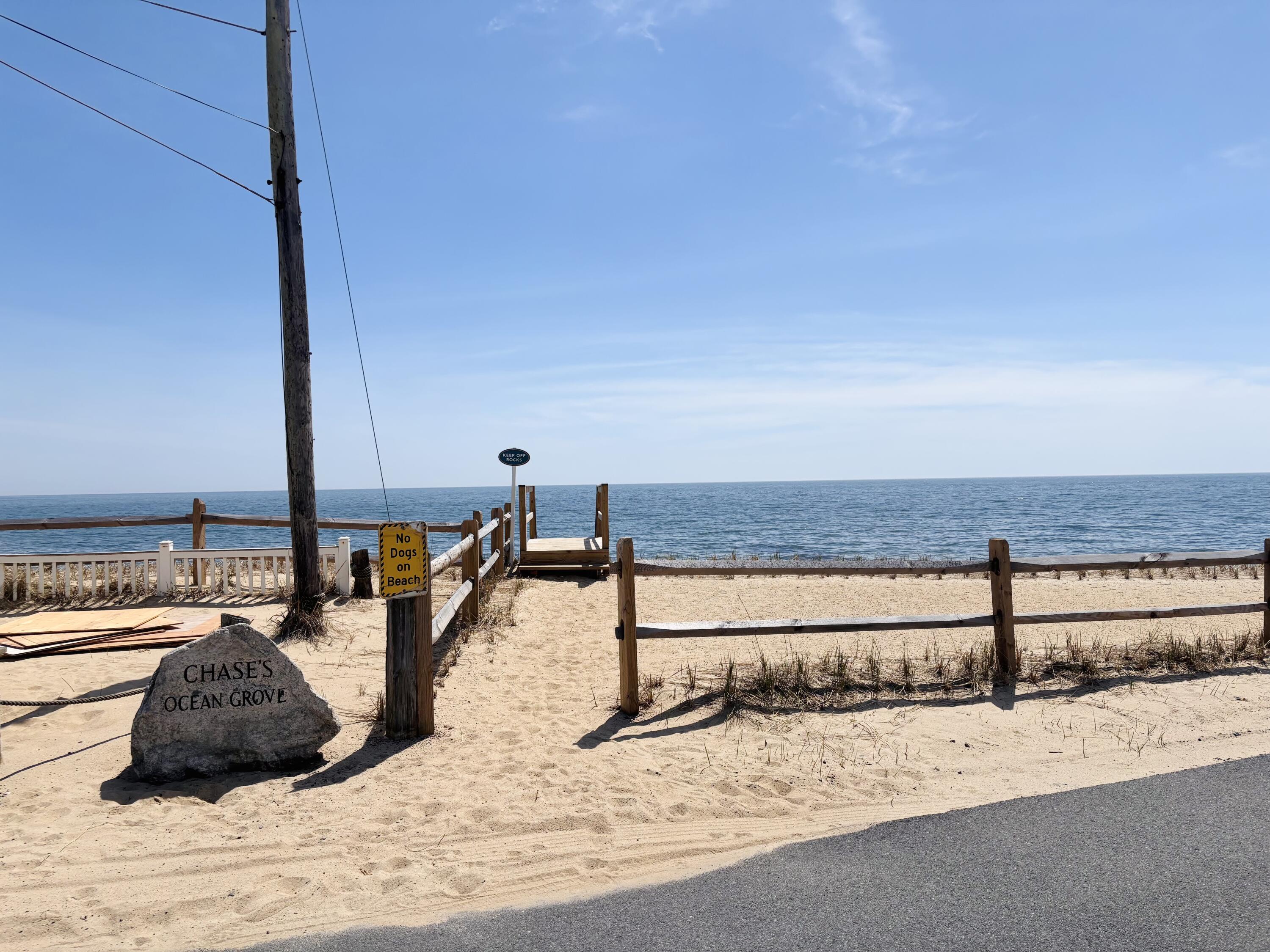 241 Old Wharf Road, Unit 91 Dennis Port, MA 02639 - Photo 14 of 16 a view of a swimming pool and an outdoor space