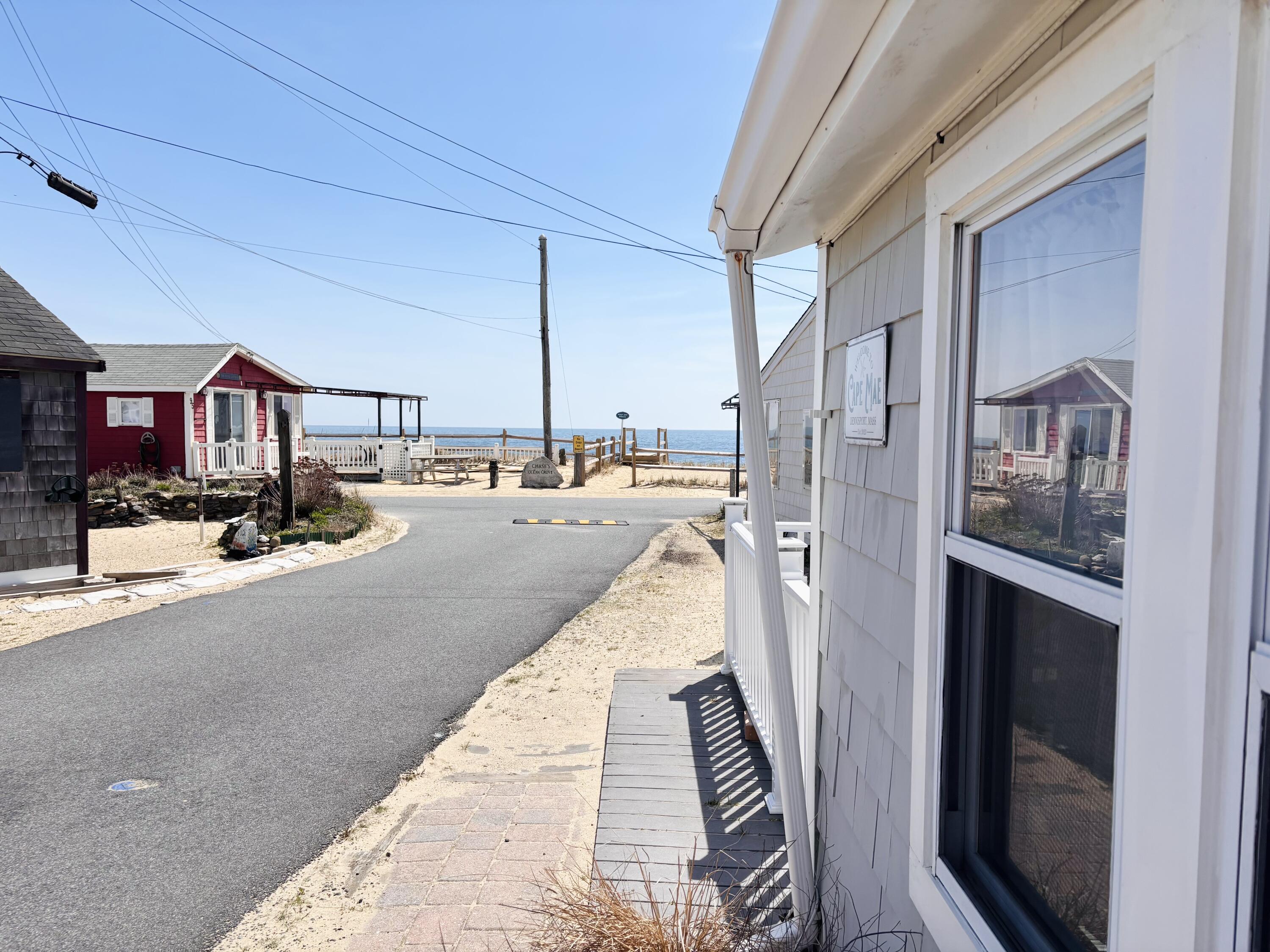 241 Old Wharf Road, Unit 91 Dennis Port, MA 02639 - Photo 2 of 16 a city view with tall buildings