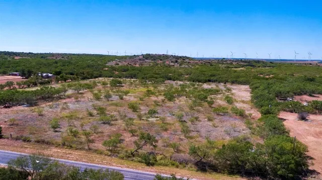 a view of a yard with an outdoor space