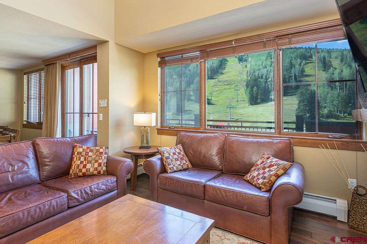 24 Sheol Street, Unit 504 Durango, CO 81301 - Photo 6 of 22 a living room with furniture and a large window
