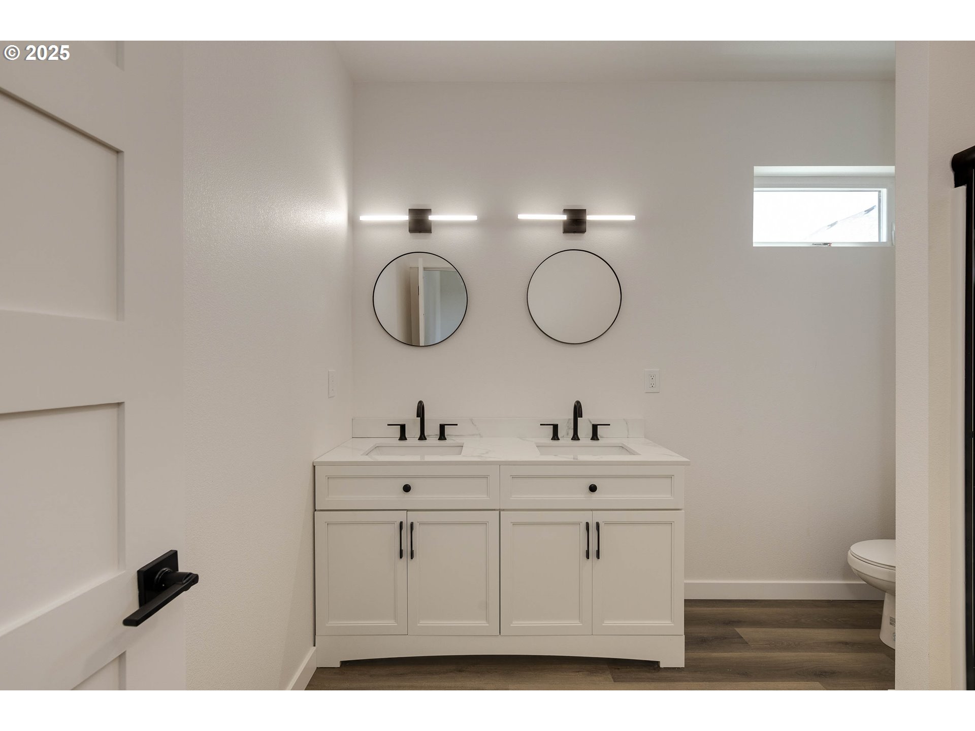 4801 Southeast Ina Avenue Milwaukie, OR 97267 - Photo 10 of 25 a bathroom with a sink vanity and a mirror