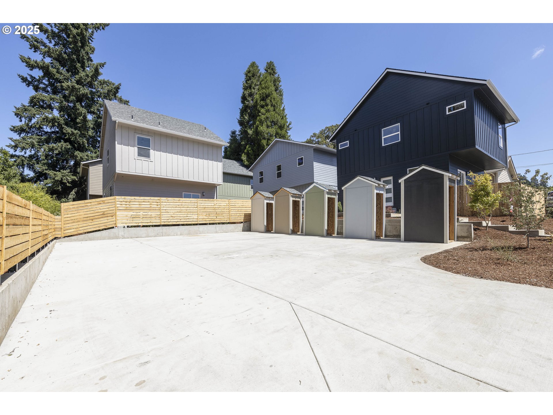 4801 Southeast Ina Avenue Milwaukie, OR 97267 - Photo 12 of 25 a front view of a house with a yard