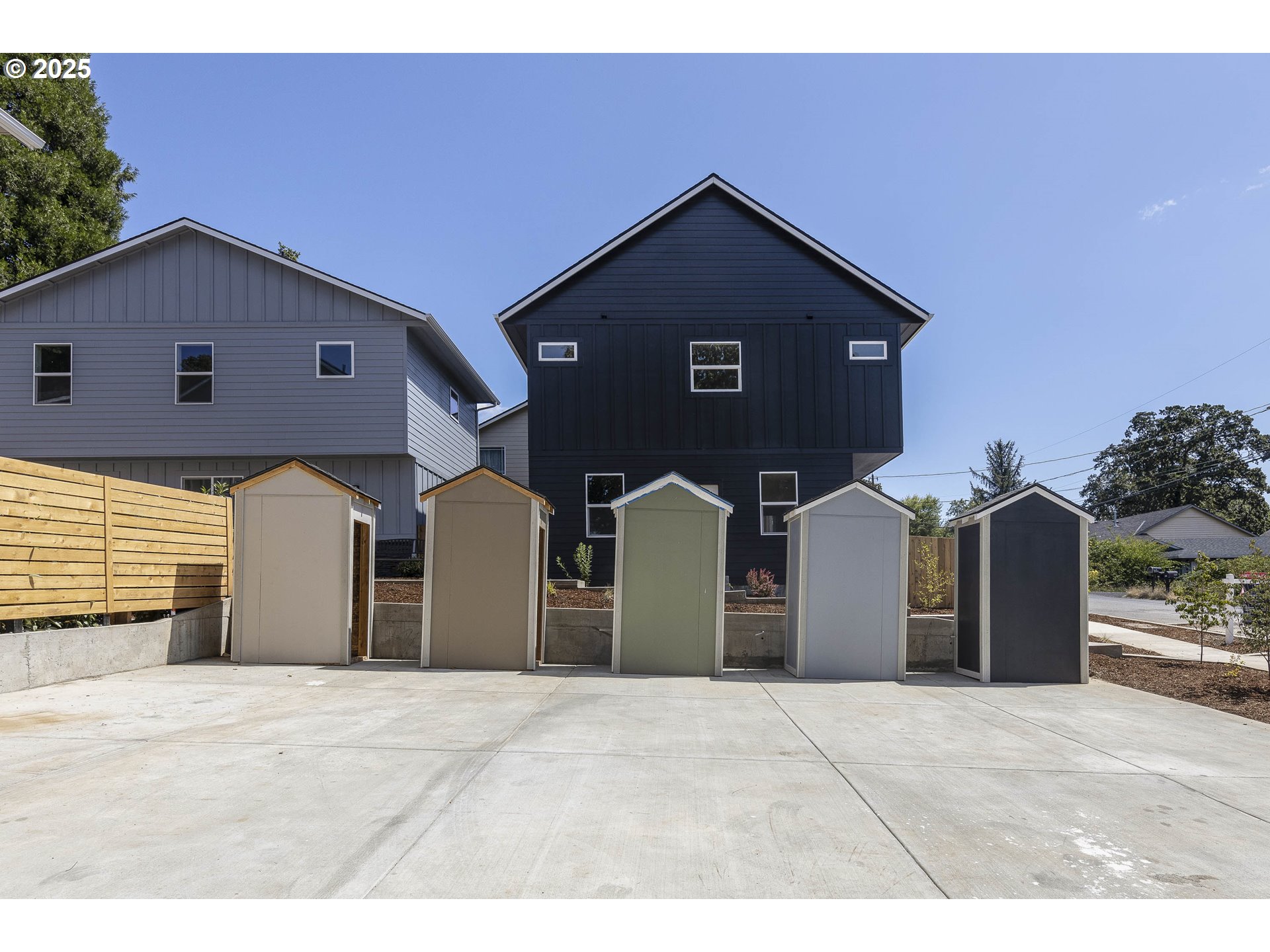 4801 Southeast Ina Avenue Milwaukie, OR 97267 - Photo 13 of 25 a front view of a house with large windows