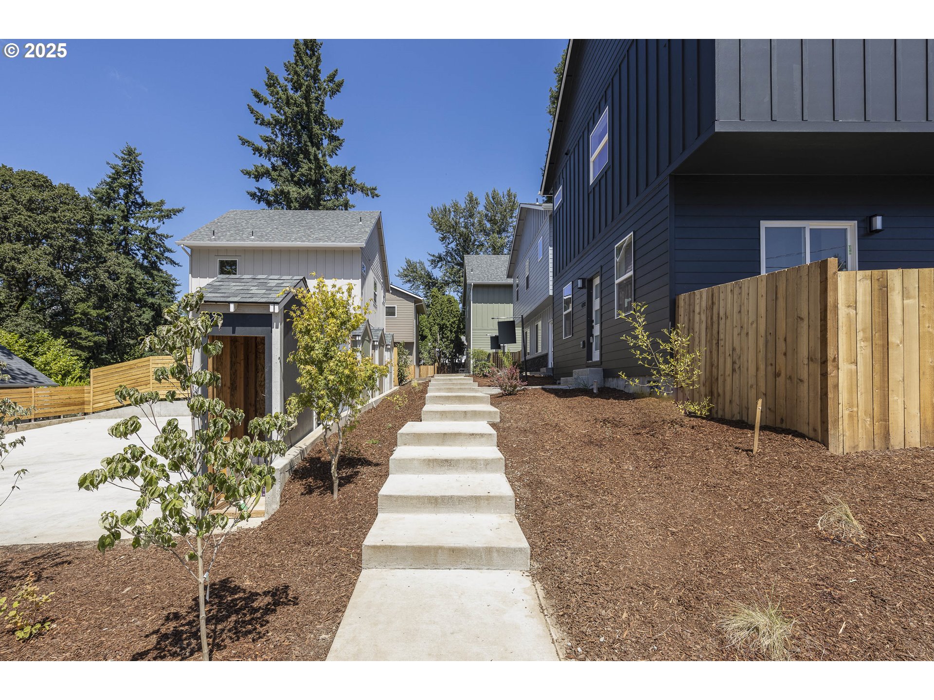 4801 Southeast Ina Avenue Milwaukie, OR 97267 - Photo 15 of 25 a front view of a house with a yard