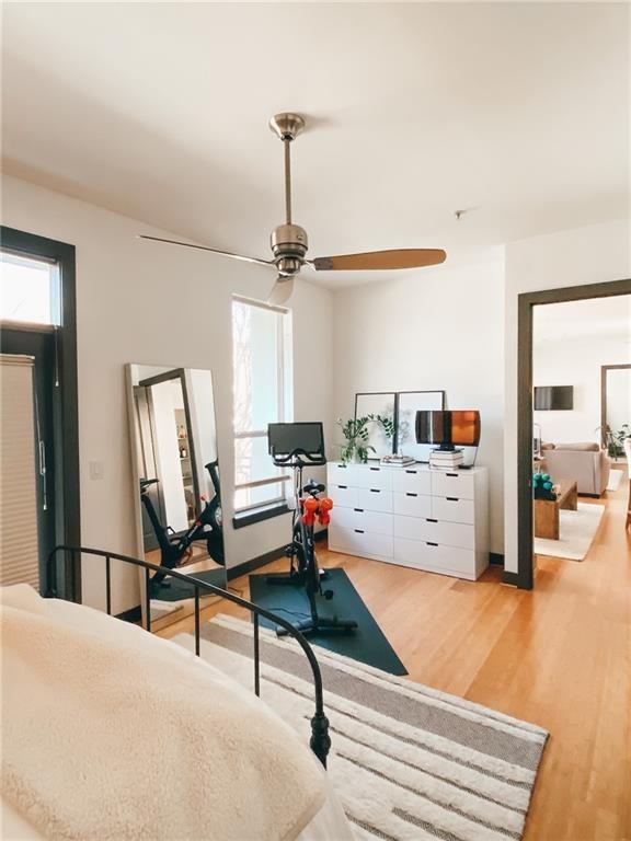 747 Ralph McGill Boulevard Northeast, Unit 217 Atlanta, GA 30312 - Photo 17 of 28 a living room with furniture and a wooden floor