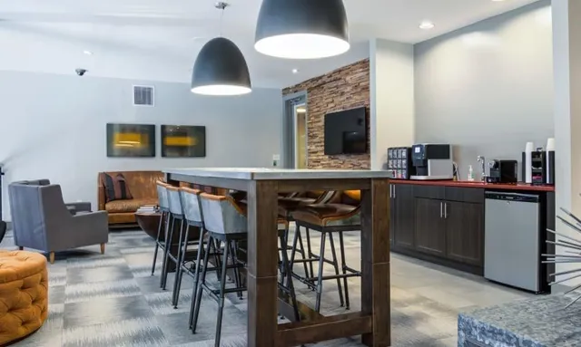 a view of a dinning table and chairs in the patio