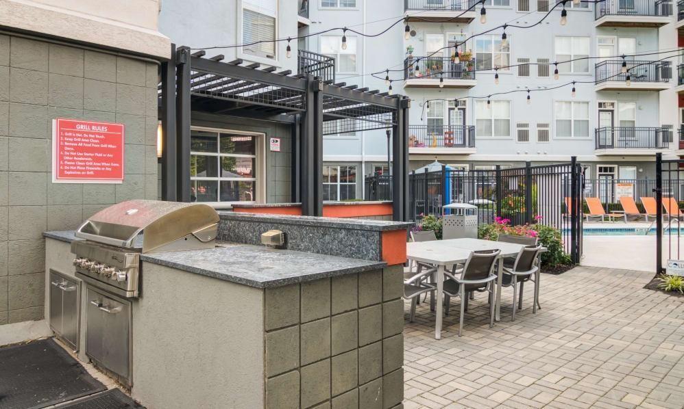 747 Ralph McGill Boulevard Northeast, Unit 217 Atlanta, GA 30312 - Photo 25 of 28 a view of a dinning table and chairs in the patio
