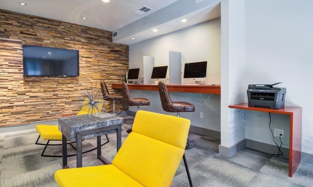 747 Ralph McGill Boulevard Northeast, Unit 217 Atlanta, GA 30312 - Photo 26 of 28 a living room with furniture and flat screen tv