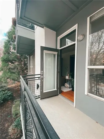 a living room with lots of furniture and a table