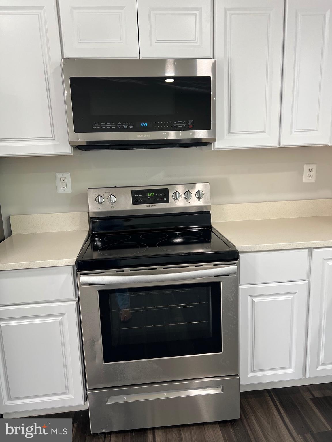 6604 Suitland Road Suitland, MD 20746 - Photo 21 of 27 a stove top oven sitting inside of a kitchen